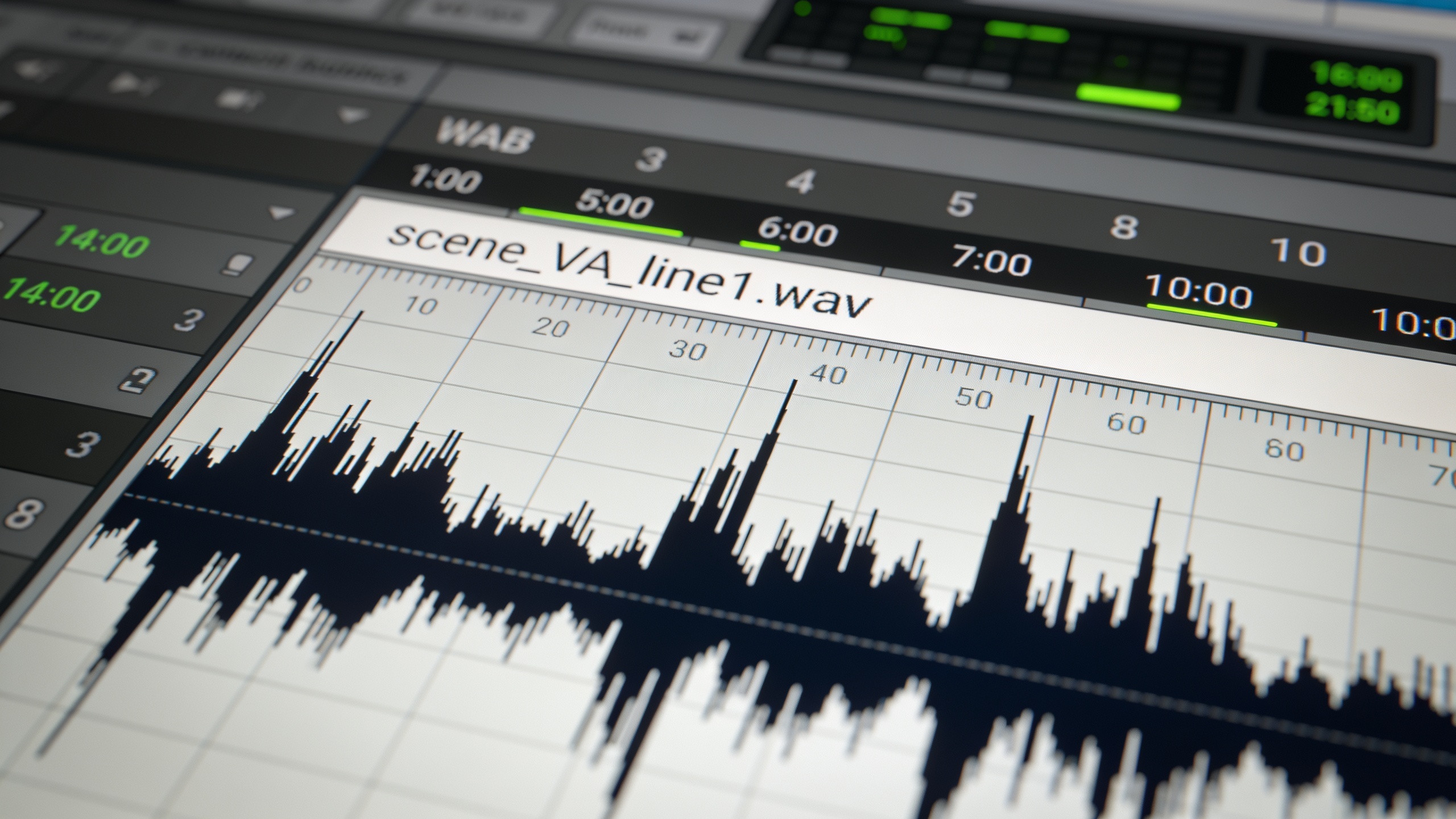DAW screen close-up showing labeled WAV files and waveforms