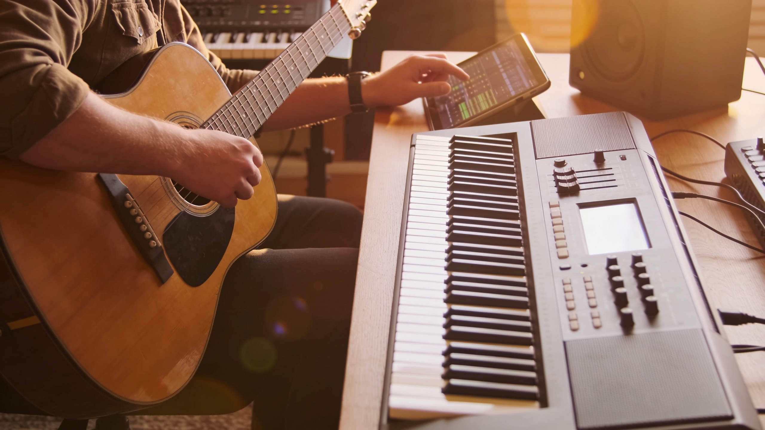Acoustic guitar and synth in a jingle production setup