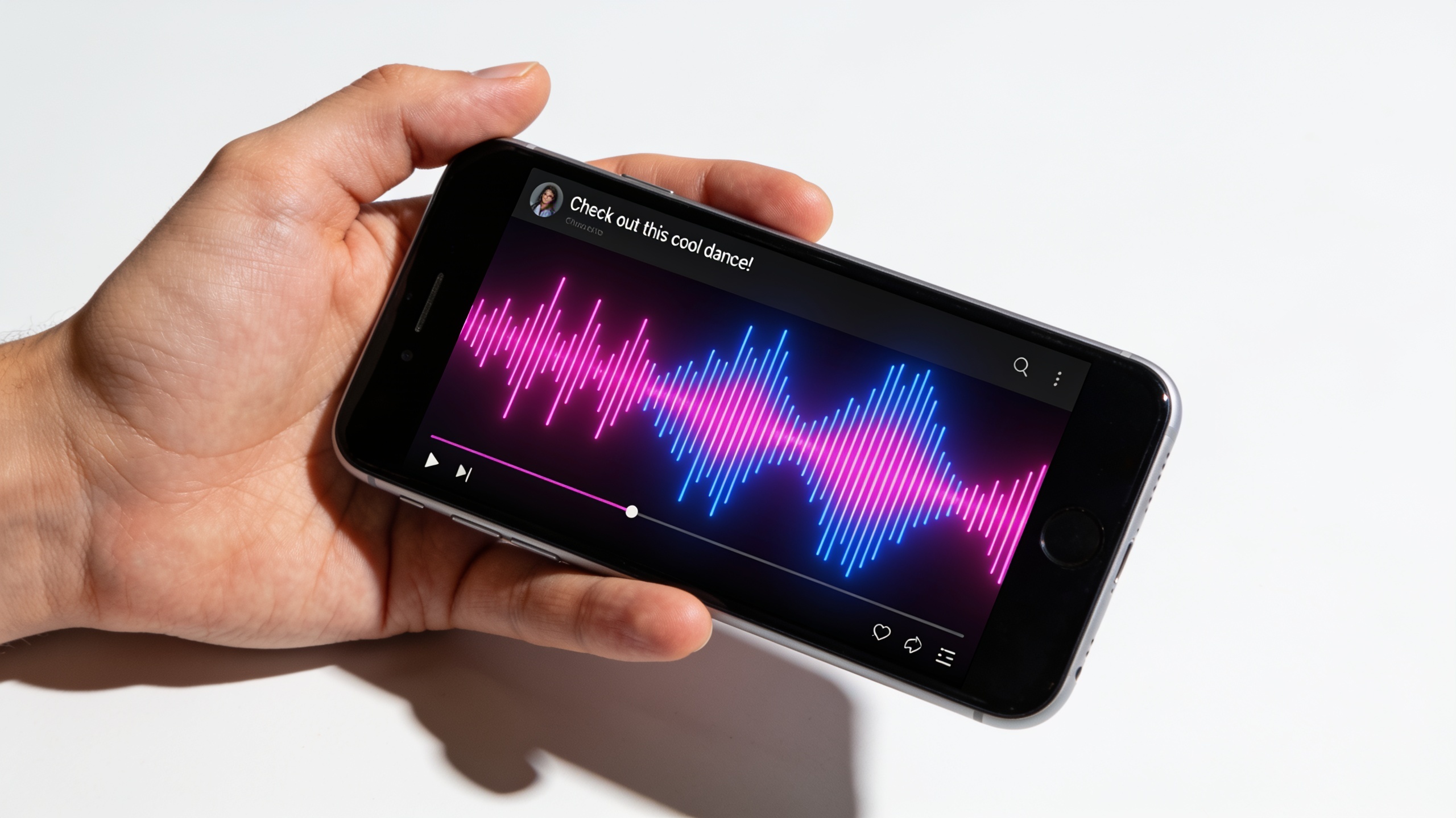 Smartphone showing social clip with captions and waveform