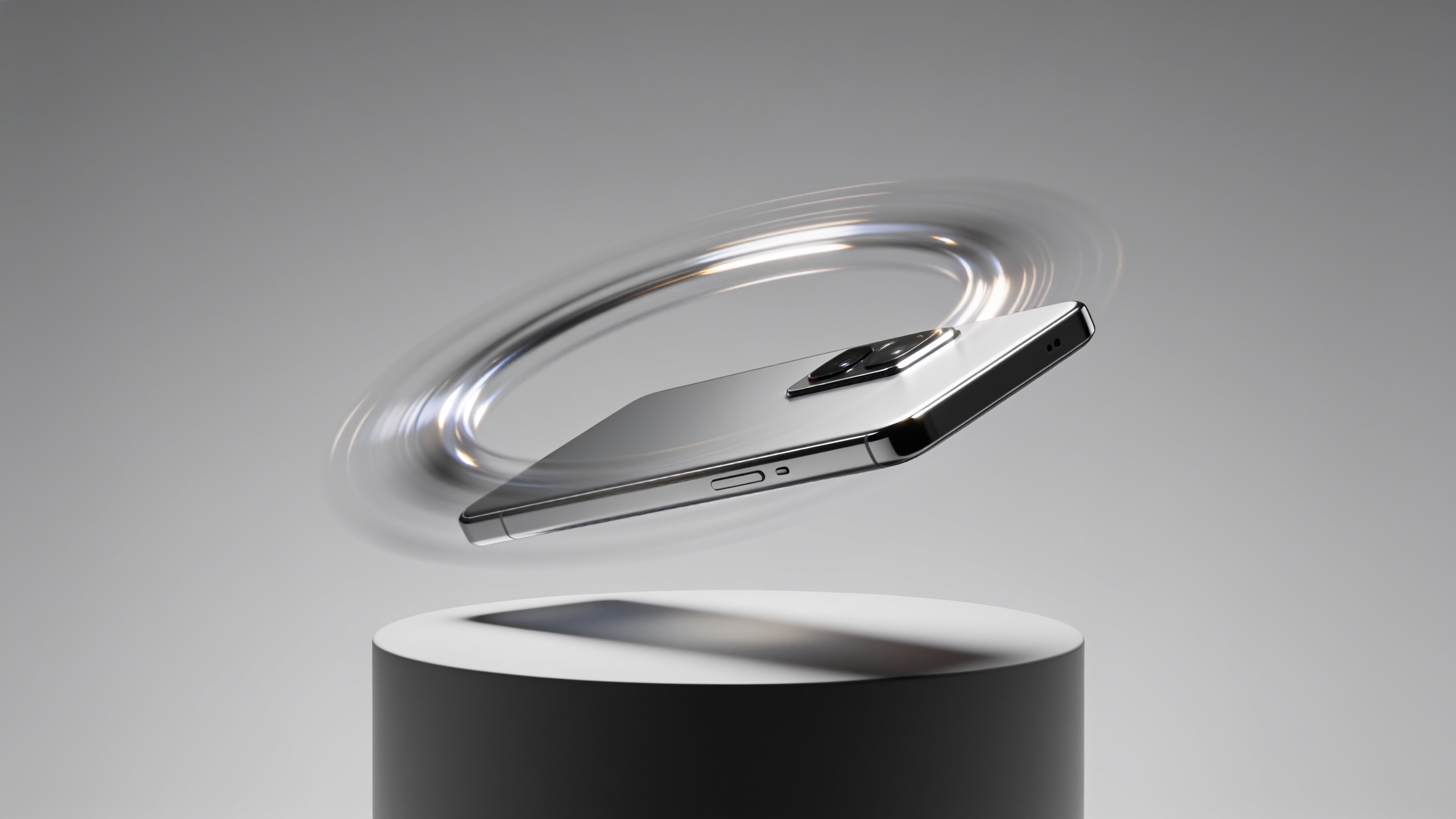 Rotating product on a pedestal with studio highlights in vertical crop.